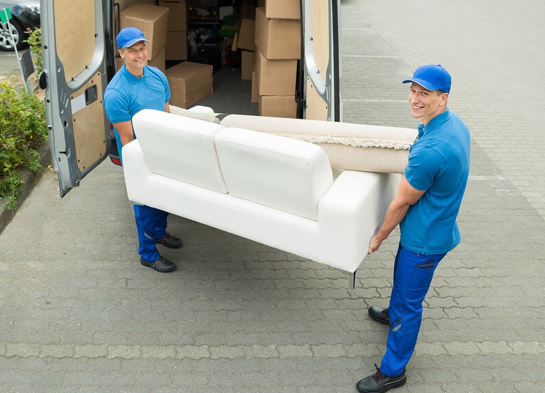 men lifting sofa